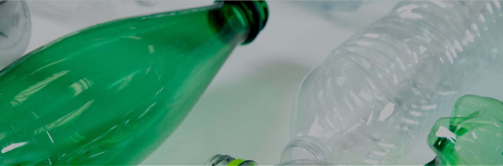 Clear and green plastic bottles